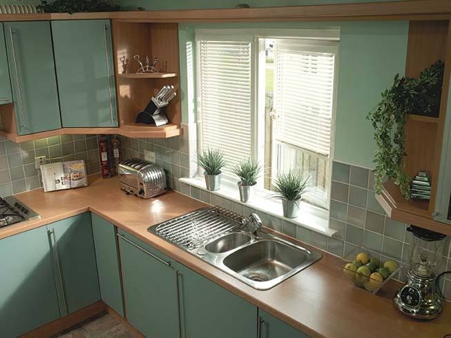 mint green coloured kitchen